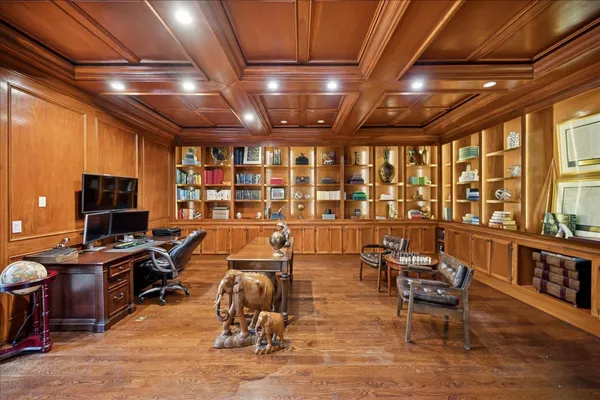 a view of a workspace with furniture
