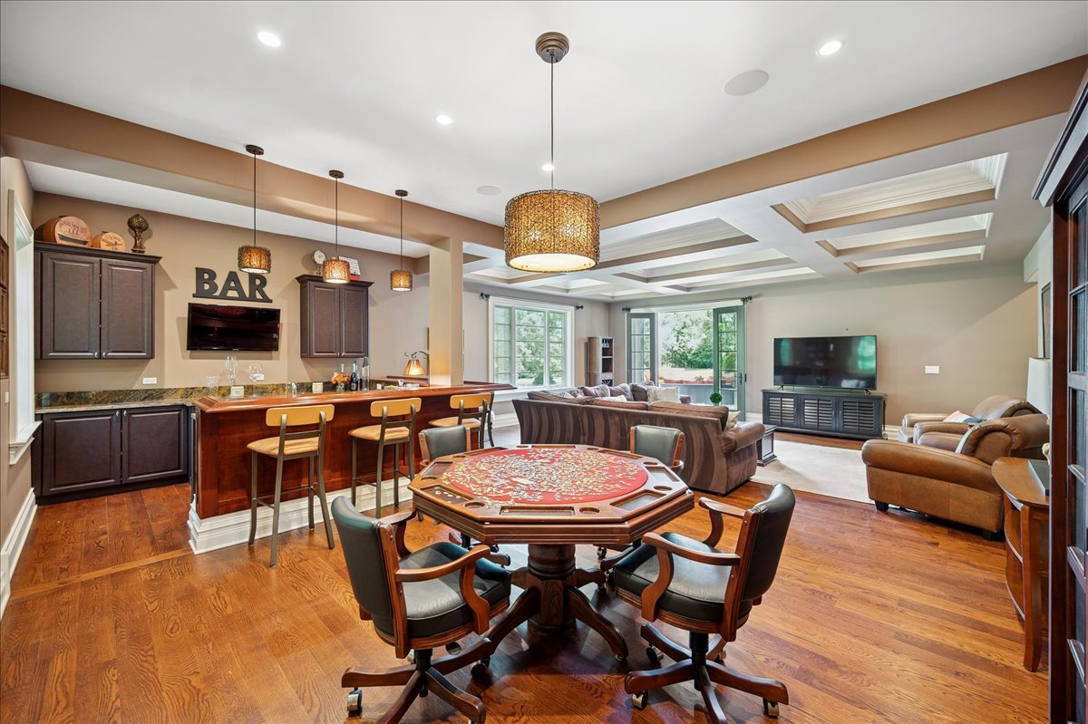 24 Bridlewood Road Northbrook, IL 60062 - Photo 19 of 56 a view of a dining room with furniture window and wooden floor