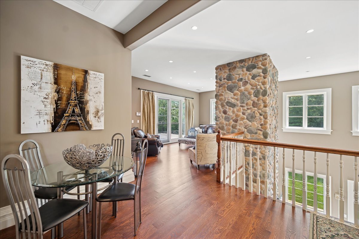 24 Bridlewood Road Northbrook, IL 60062 - Photo 39 of 56 a view of a dining room with furniture window and wooden floor