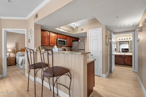 a view of a kitchen with furniture and a kitchen