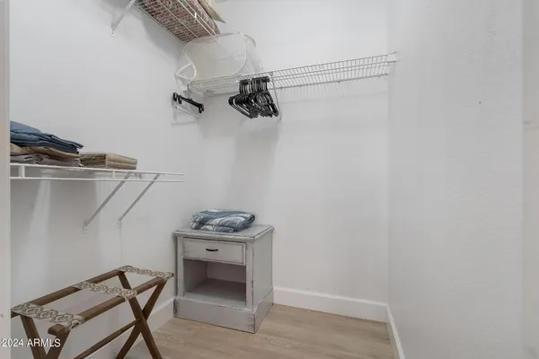 a view of a room with racks on the wall