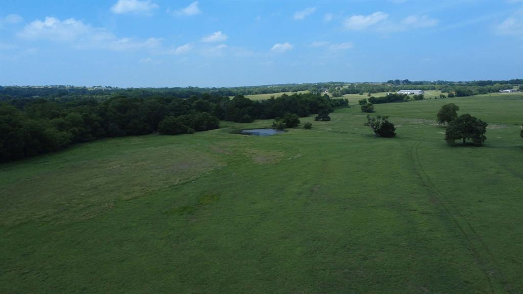 730 North St Decatur Tx 76234 Decatur, TX 76234 - Photo 3 of 14 a view of a lake with a yard