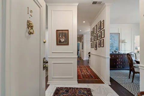 a view of entryway with furniture and rug
