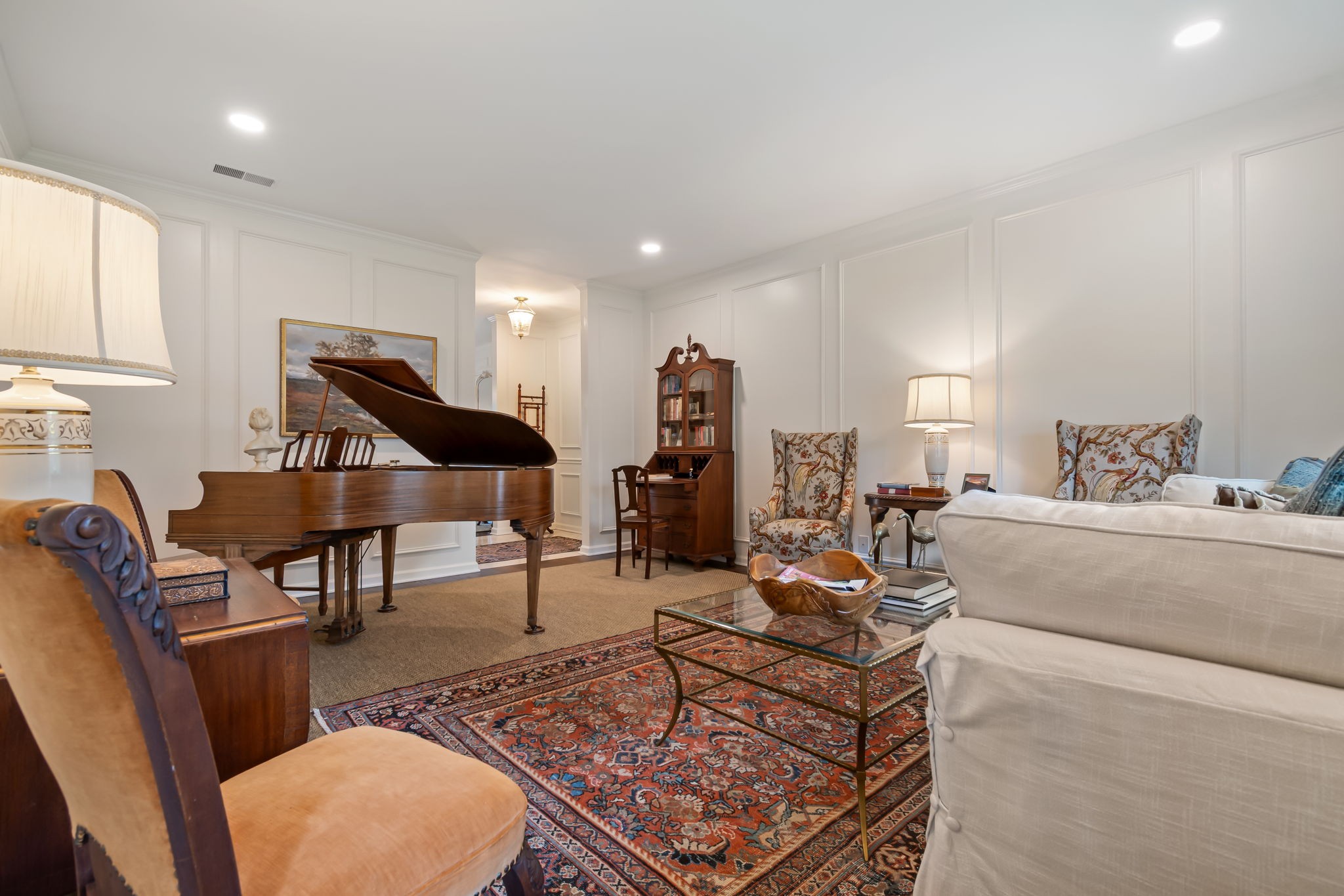 4487 Post Place, Unit 12 Nashville, TN 37205 - Photo 11 of 39 a living room with furniture a rug and a piano