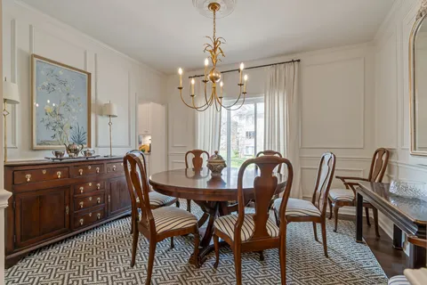 a view of a a dining room with furniture