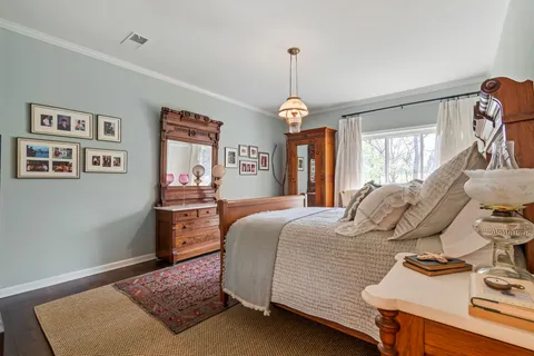 a bed room with a bed and a tv
