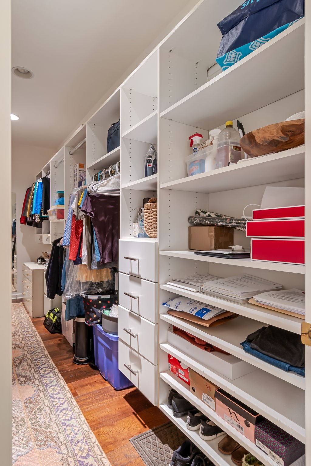 4487 Post Place, Unit 12 Nashville, TN 37205 - Photo 37 of 39 a view of walk in closet with clothes and shoes