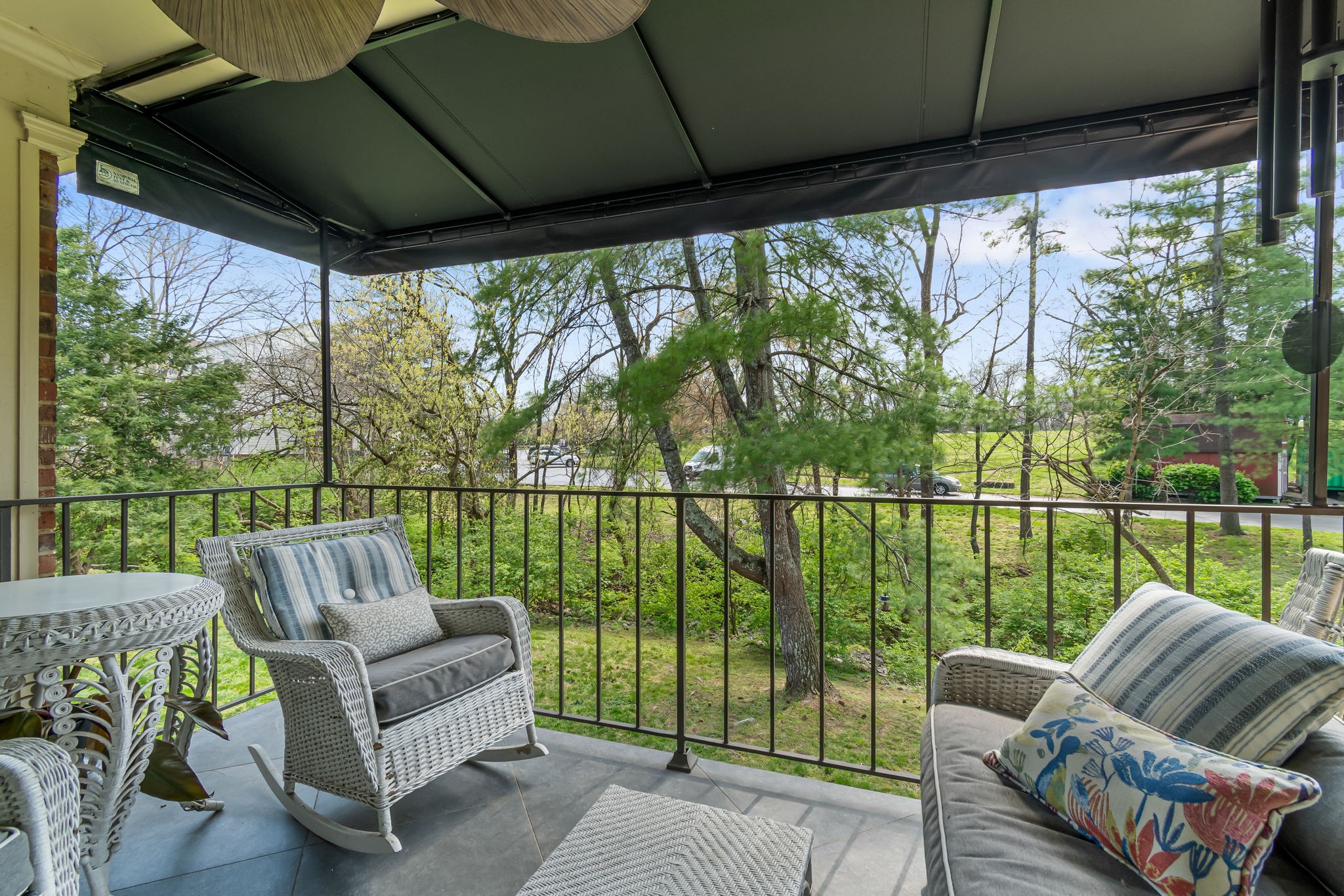 4487 Post Place, Unit 12 Nashville, TN 37205 - Photo 39 of 39 a view of a chair and couches in the patio