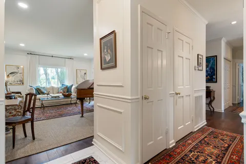 a living room with furniture and a rug
