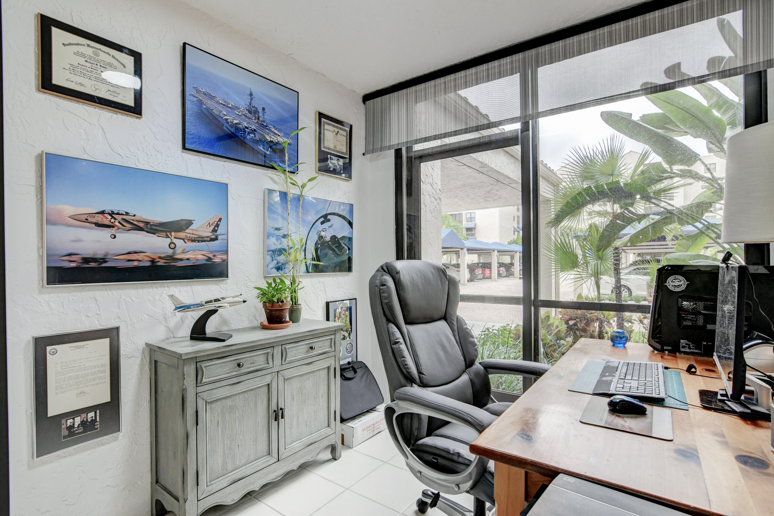 7568 Regency Lake Drive, Unit B101 Boca Raton, FL 33433 - Photo 6 of 37 Glass Enclosed Office/Patio