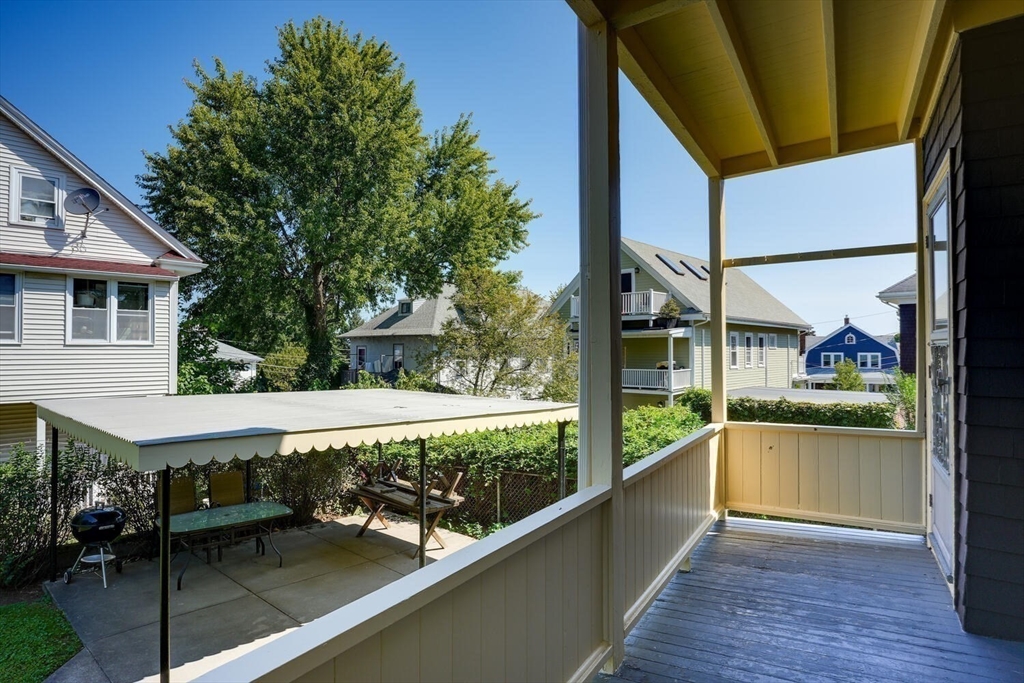13-15 Appleton Terrace Watertown, MA 02472 - Photo 6 of 10 a view of a house with a balcony