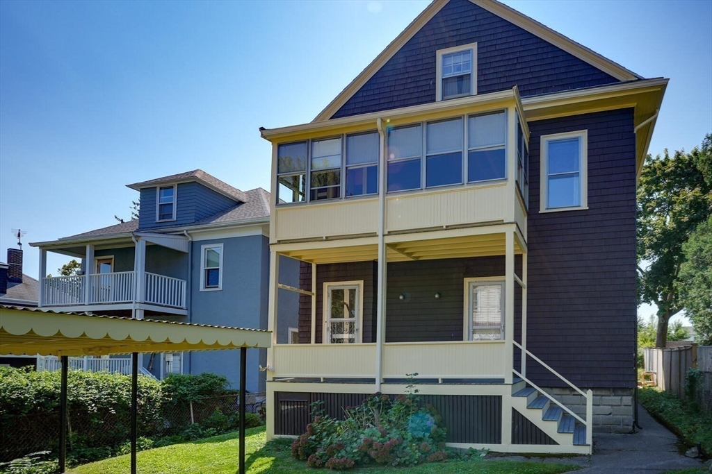 13-15 Appleton Terrace Watertown, MA 02472 - Photo 8 of 10 a front view of a house with garden