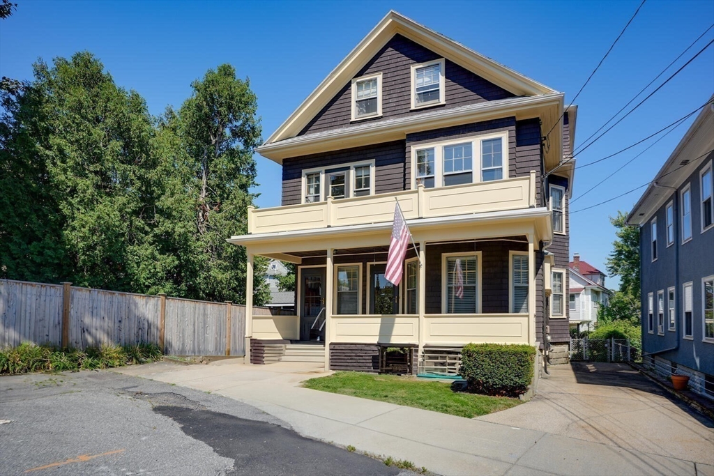 13-15 Appleton Terrace Watertown, MA 02472 - Photo 10 of 10 a front view of a house with a yard