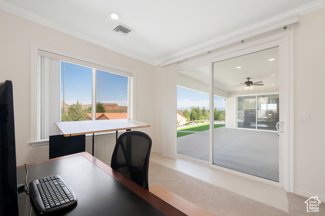 230 Boulder Way Leeds, UT 84746 - Photo 17 of 72 Spacious Home Office attached to master suite with crown molding, recessed lighting, light colored carpet, and a ceiling fan plus sliding glass doors to the rear covered patio.