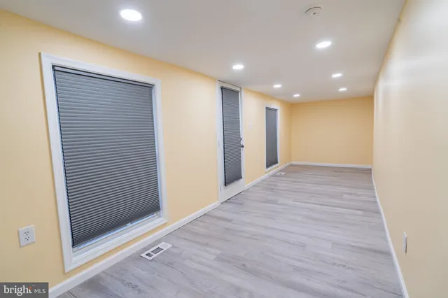 a view of hallway with a large window