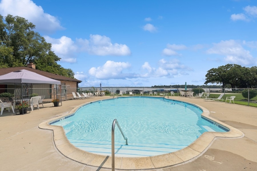 21 Mineola Road Fox Lake, IL 60020 - Photo 19 of 21 an outdoor view with swimming pool and seating space