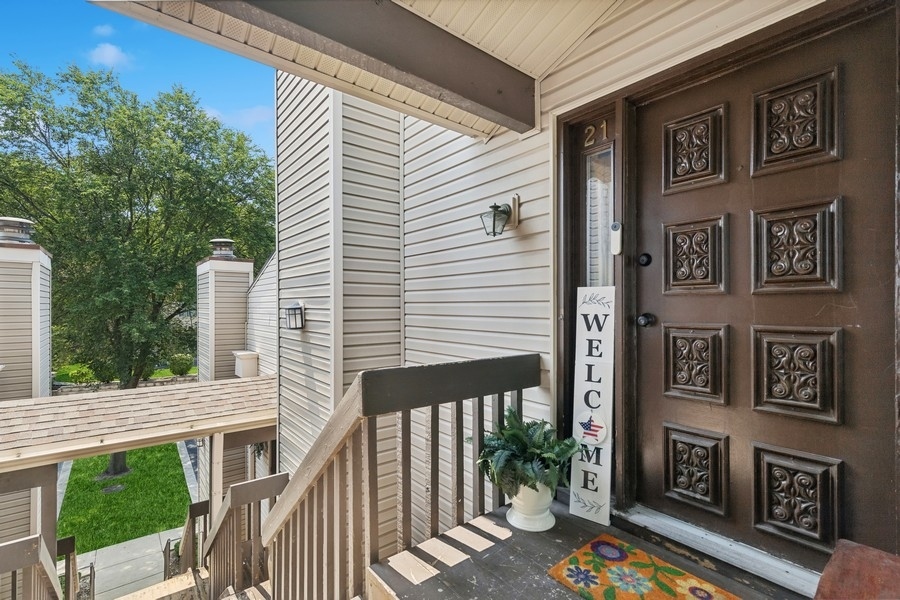 21 Mineola Road Fox Lake, IL 60020 - Photo 2 of 21 a view of a brick house with a street