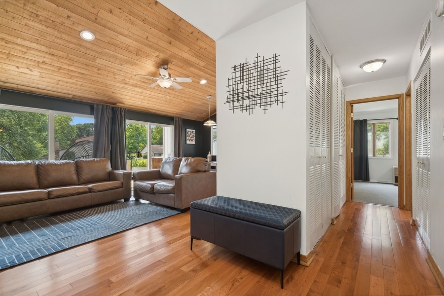 21 Mineola Road Fox Lake, IL 60020 - Photo 3 of 21 a living room with furniture and wooden floor