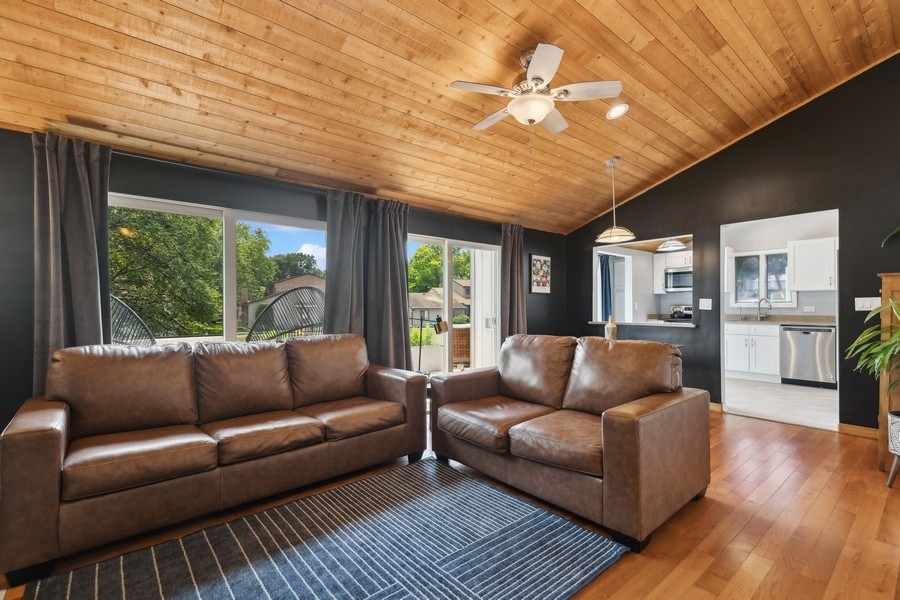 21 Mineola Road Fox Lake, IL 60020 - Photo 4 of 21 a living room with furniture and a large window