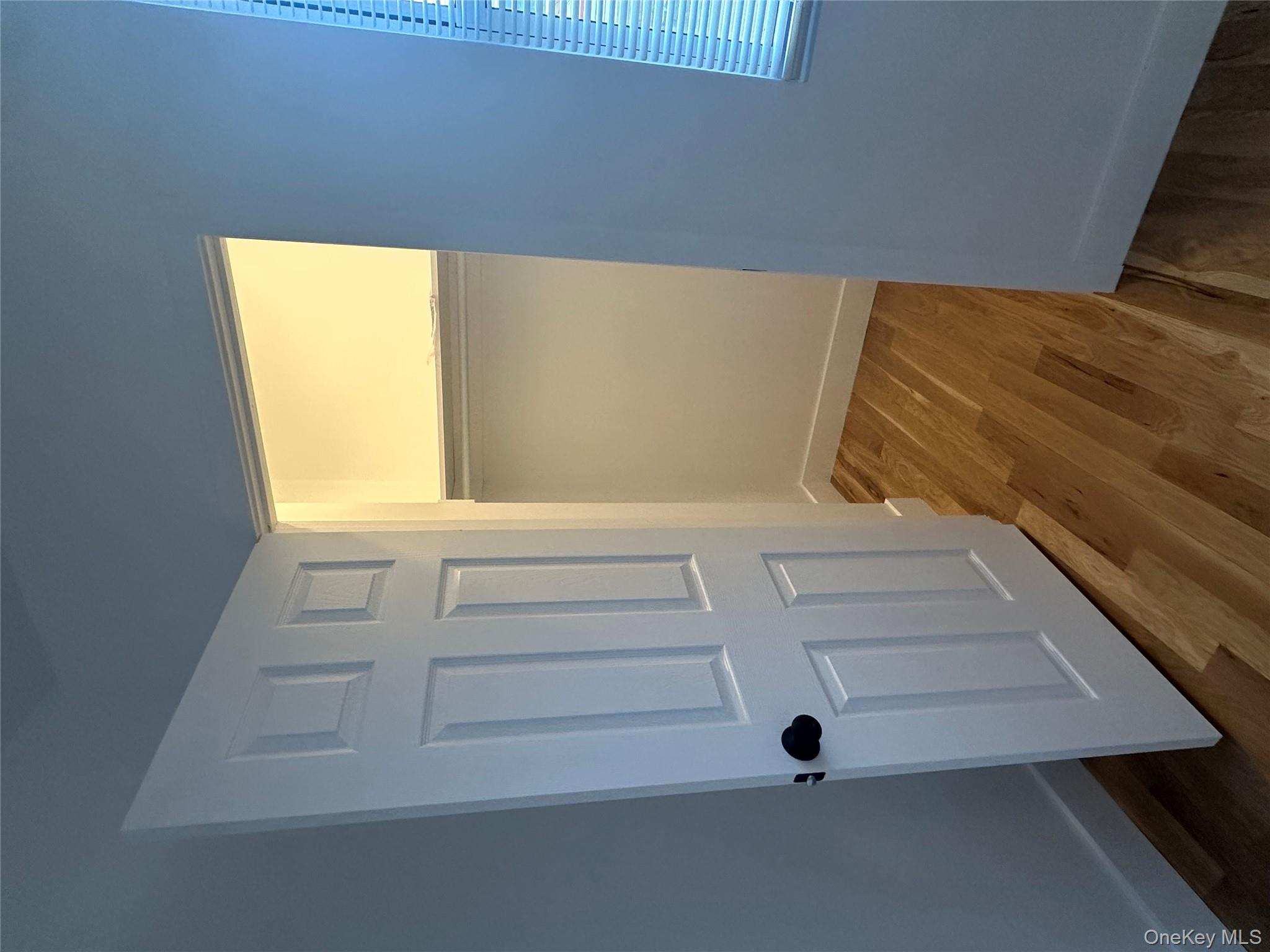 Undisclosed Address Queens, NY 11416 - Photo 7 of 10 a view of front door