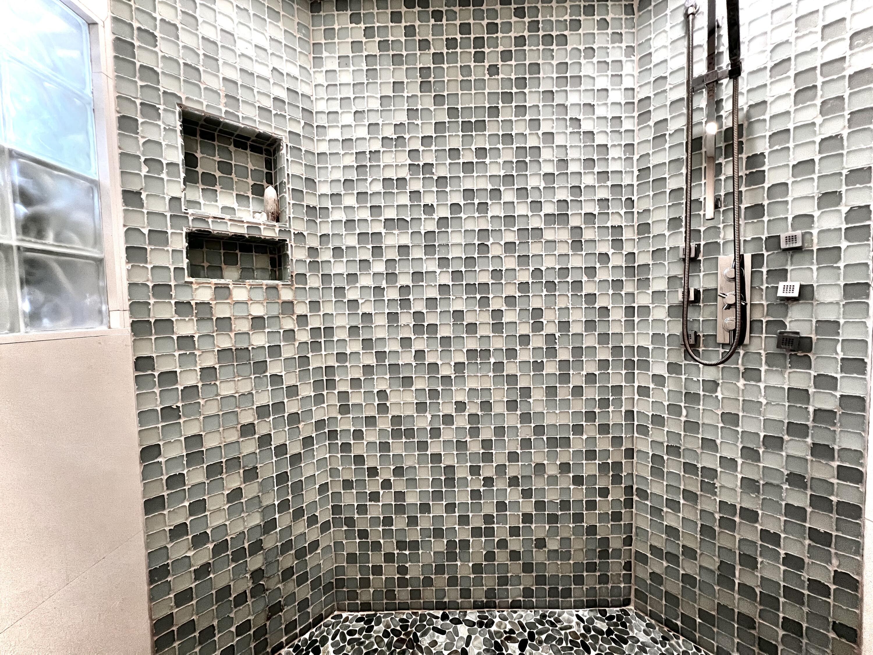 1421 Reynolds Street Key West, FL 33040 - Photo 22 of 45 a bathroom with a shower and a sink