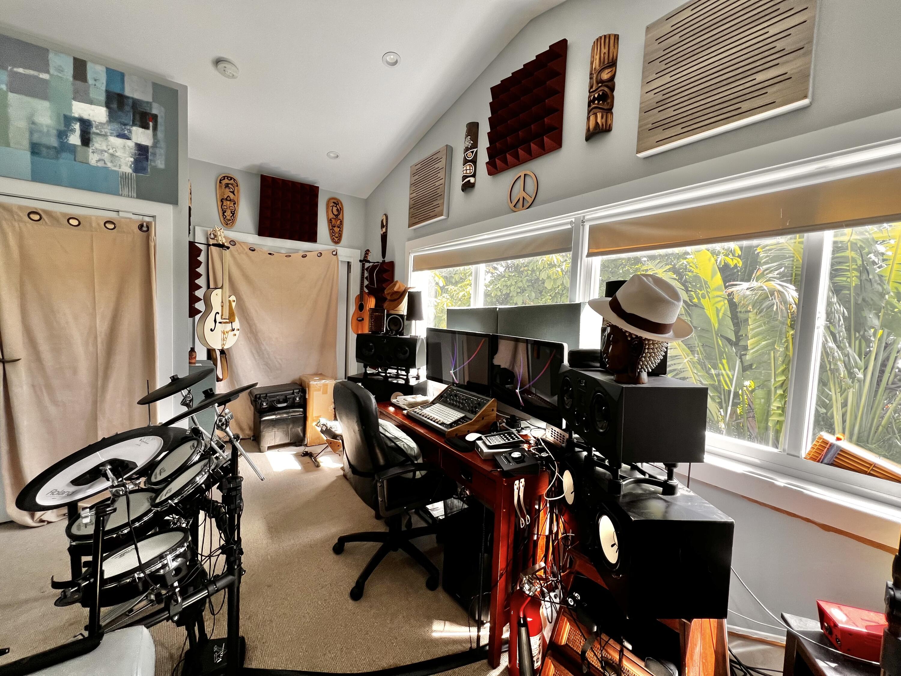 1421 Reynolds Street Key West, FL 33040 - Photo 31 of 45 a view of a workspace with furniture and a window