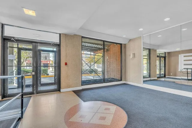 an empty room with entrance door