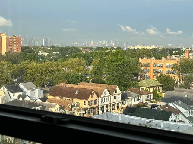 a view of a lake from a balcony