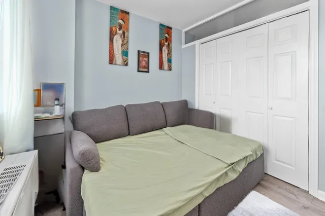 a bed room with a bed and a couch