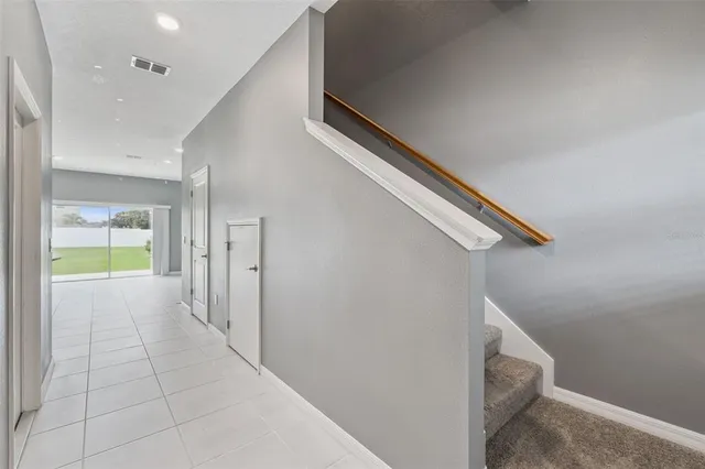 a view of hallway with stairs