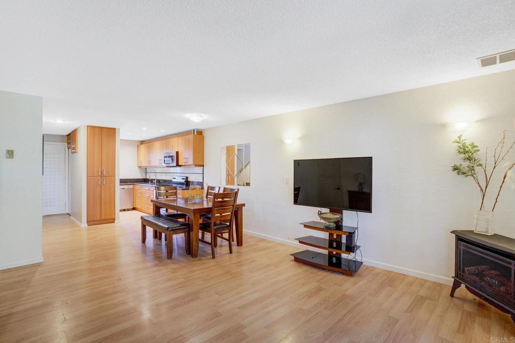 150 E Street, Unit A1 Chula Vista, CA 91910 - Photo 13 of 55 a view of a livingroom with furniture and a flat screen tv