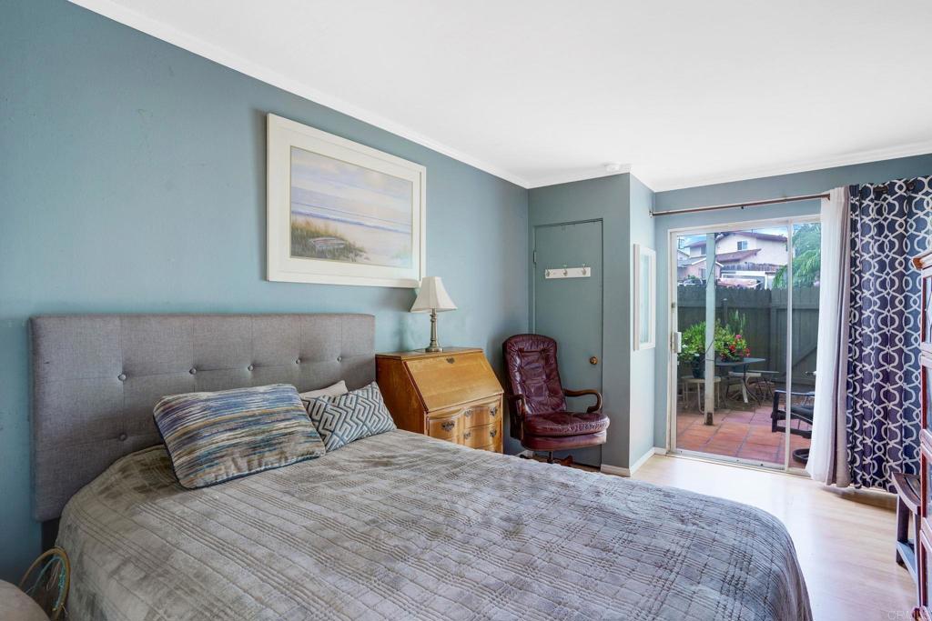 150 E Street, Unit A1 Chula Vista, CA 91910 - Photo 30 of 55 a bedroom with a large bed and a window