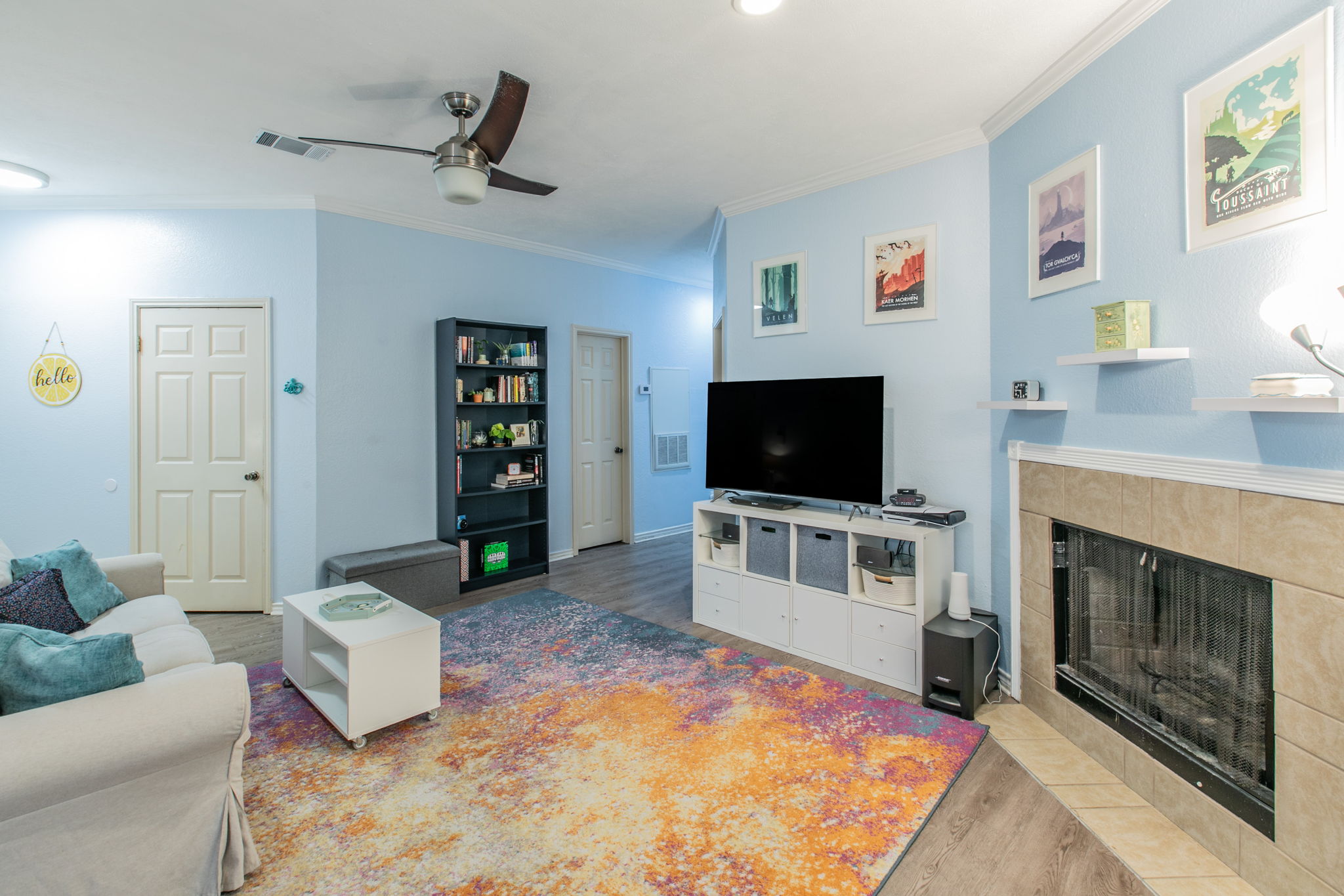 1005 North LBJ Drive, Unit B2 San Marcos, TX 78666 - Photo 2 of 19 a living room with furniture and a flat screen tv