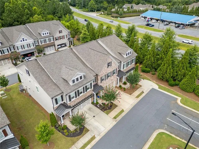 an aerial view of a house with a garden