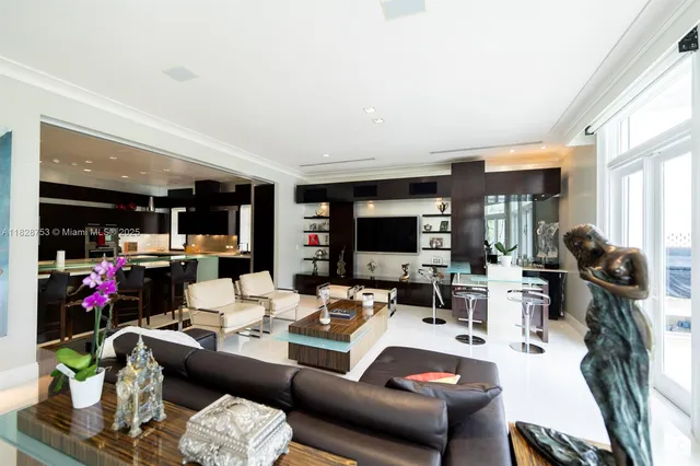 a bedroom with a bed couch and window