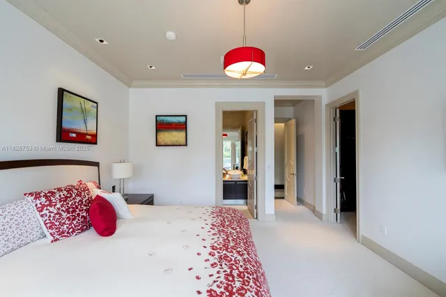 a kitchen with a sink a stove and cabinets