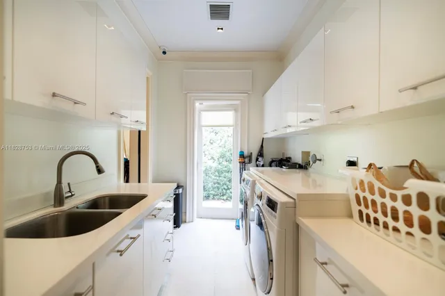 a view of empty room with wooden floor and windows