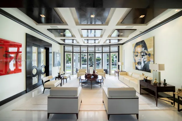 a living room with furniture or couch and a large window