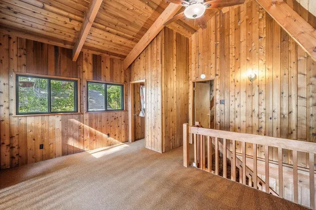 a view of entryway with a wooden door