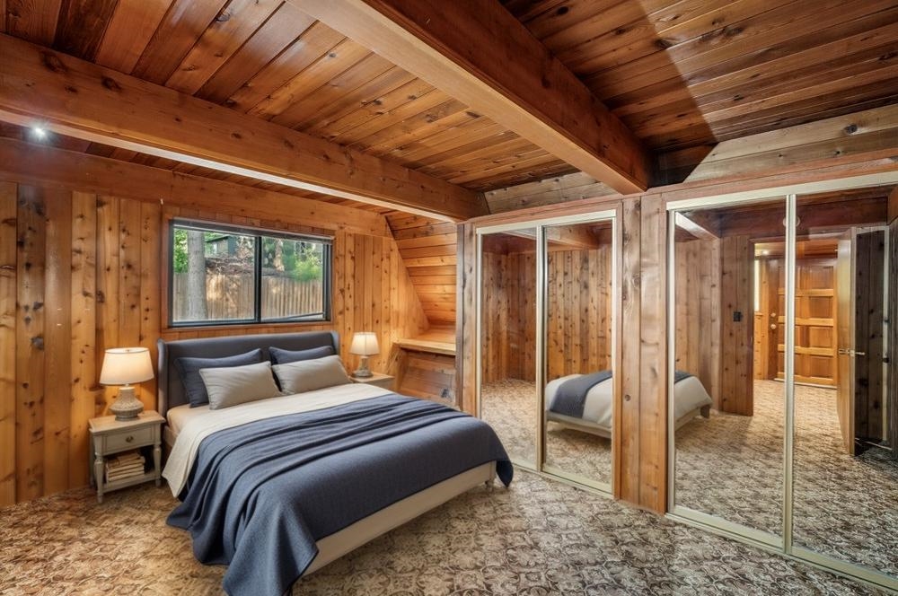 10577 Stuart Staithe Truckee, CA 96161 - Photo 16 of 22 a bedroom with a bed and glass walk in closet