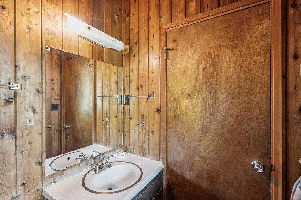 10577 Stuart Staithe Truckee, CA 96161 - Photo 19 of 22 a bathroom with a sink a toilet and shower