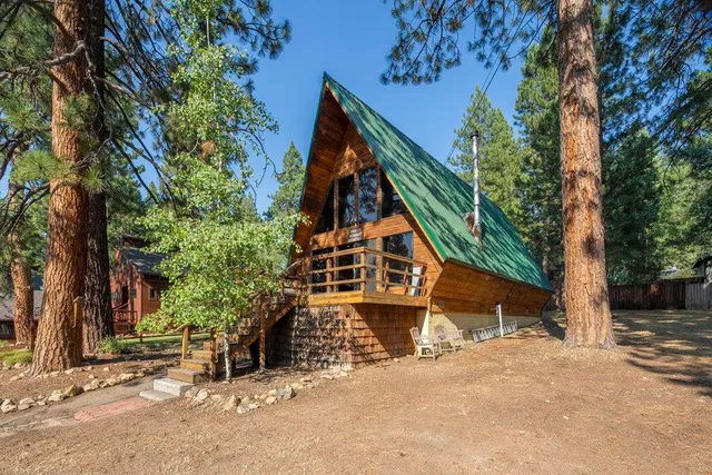 front view of a house with a trees