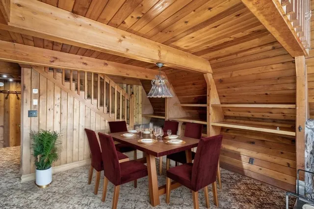 a view of an outdoor space with a table and chairs