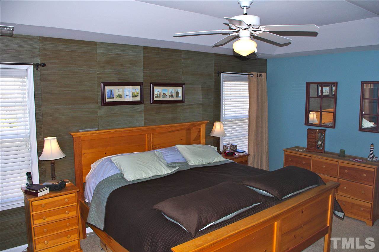 5749 Keowee Way Raleigh, NC 27616 - Photo 12 of 25 Spacious master bedroom with trey ceiling.