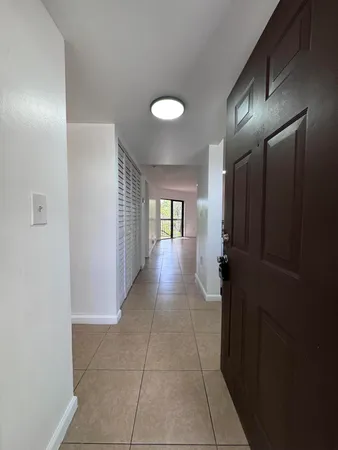a stove top oven sitting inside of a kitchen