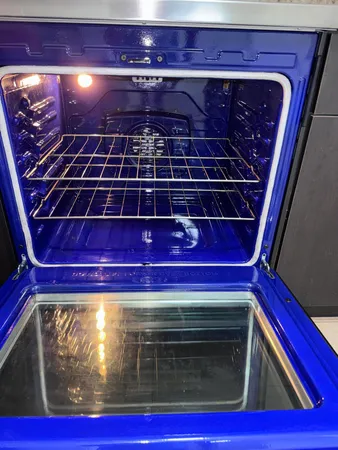 a view of a house with backyard porch and sitting area