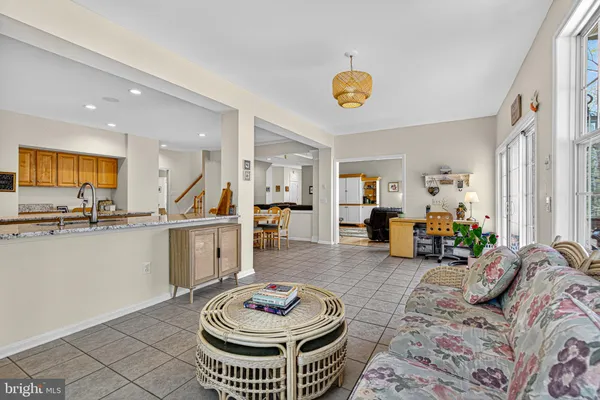 a living room with furniture and a table