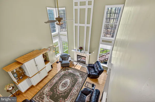 view of living room with furniture and floor to ceiling window