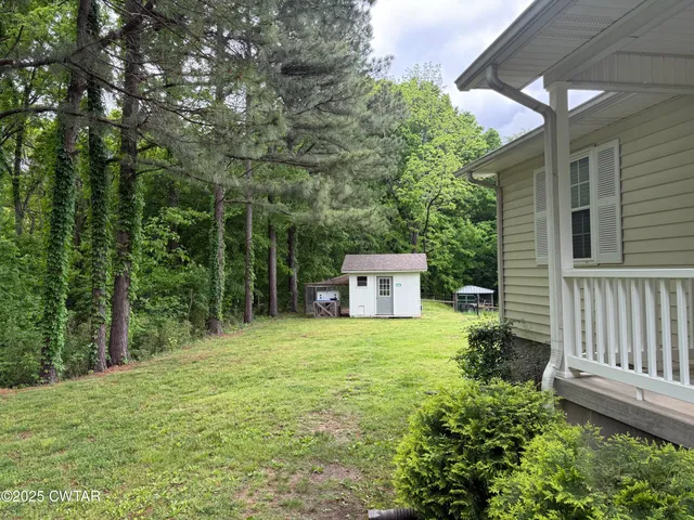 a house with trees in front of it