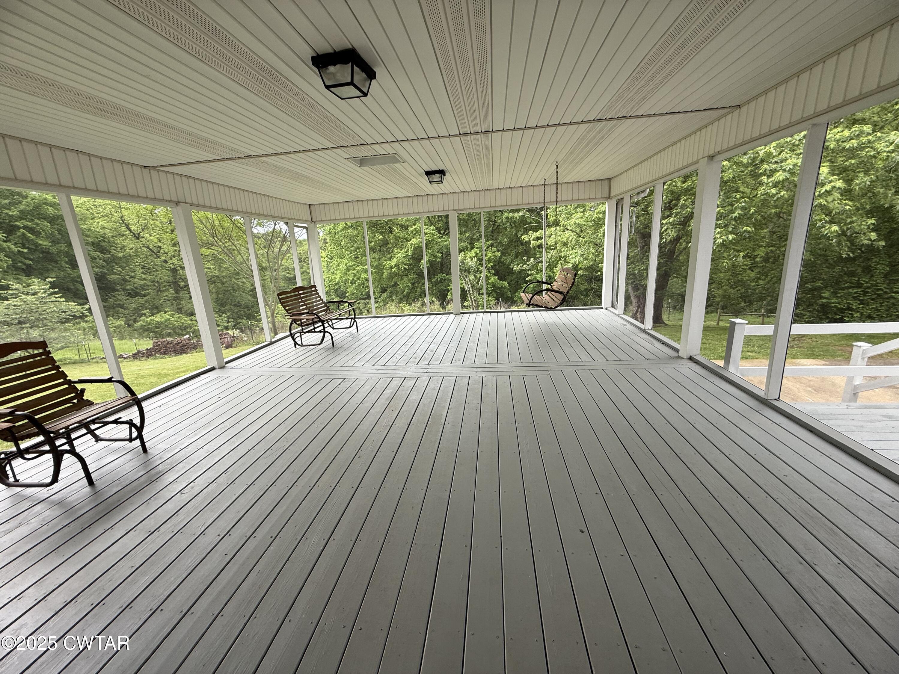 0 Webb Store Road Hornbeak, TN 38232 - Photo 3 of 22 a view of porch with wooden floor